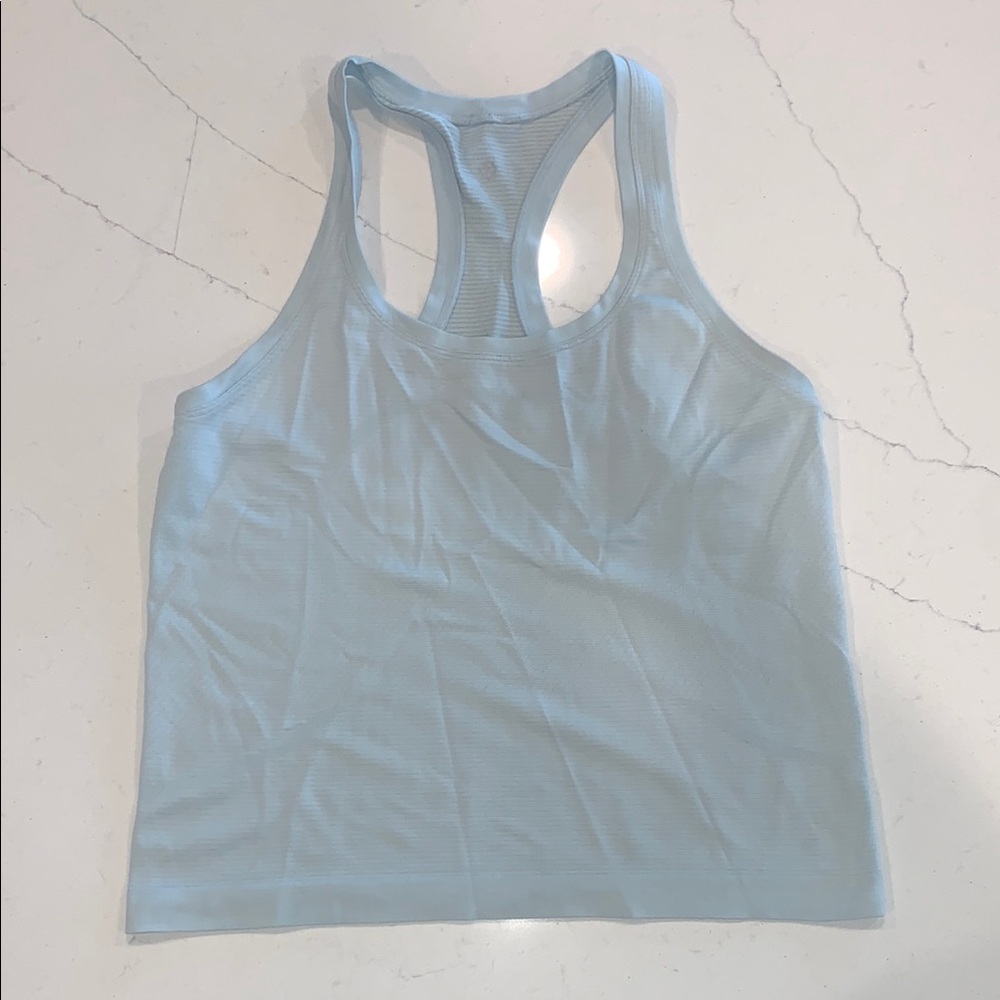 Swiftly Tech Racerback Tank Top 2.0
Hip Length